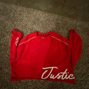 I am selling a red crop top active justice top it is eight youth